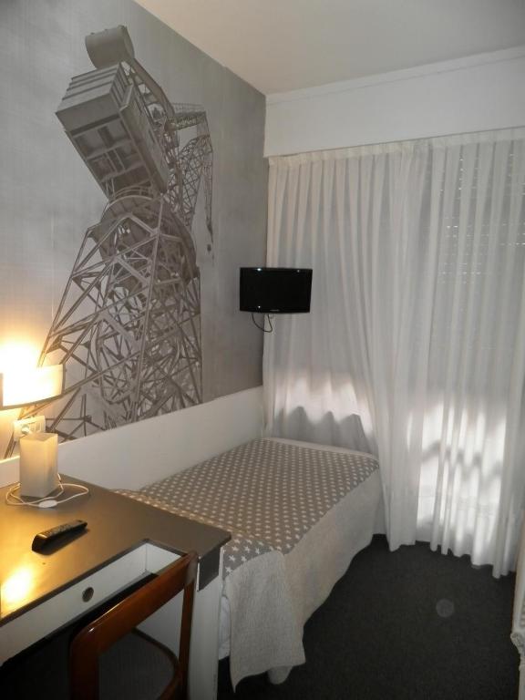 TV a/nebo společenská místnost v ubytování Hotel Photo Zabalburu