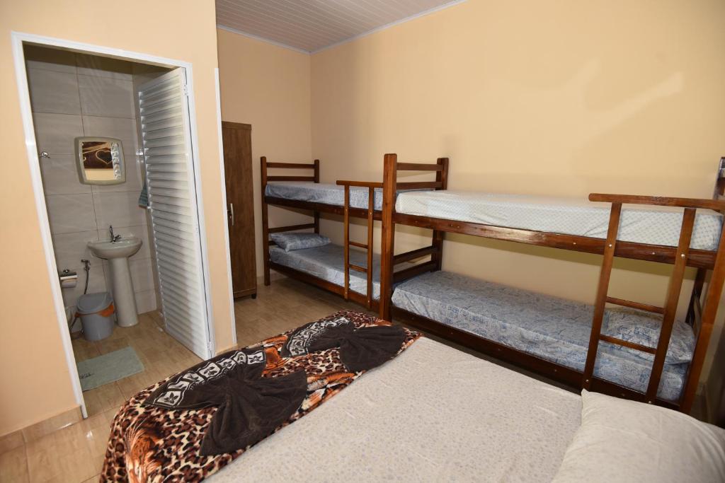 Postel nebo postele na pokoji v ubytování Pousada Serrana