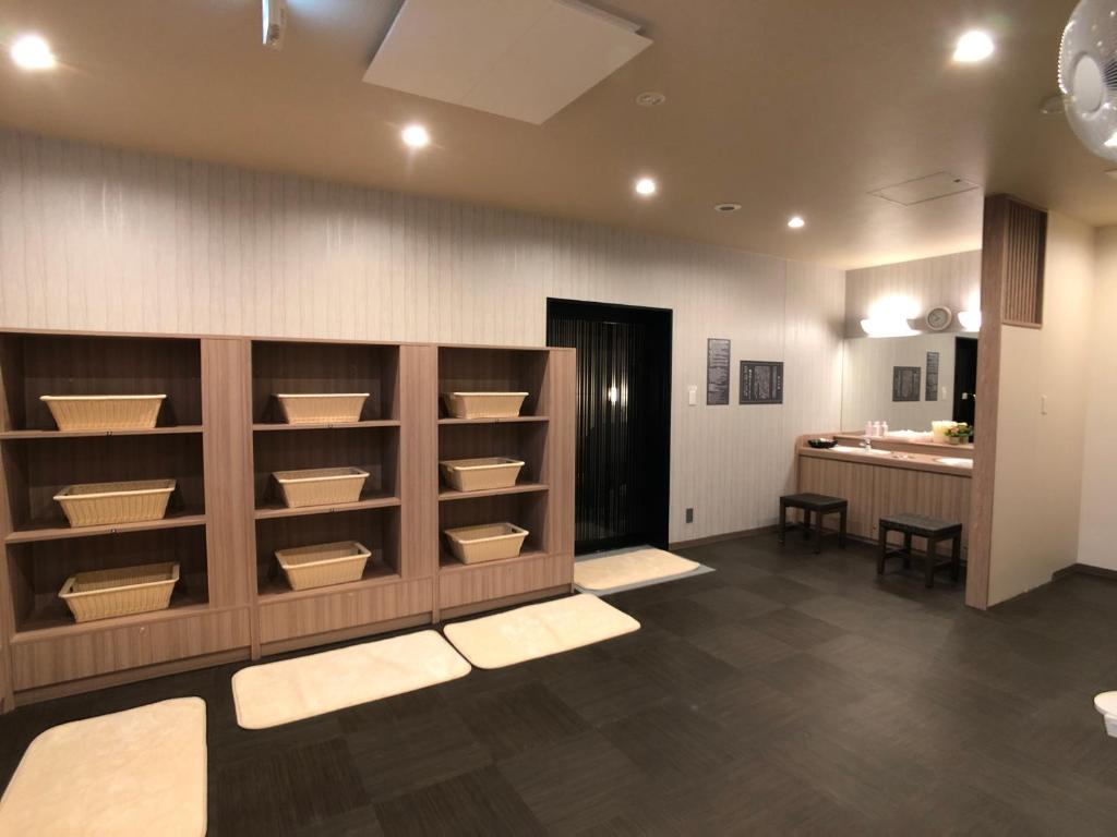 Postel nebo postele na pokoji v ubytování Hotel Route-Inn Tsuchiura