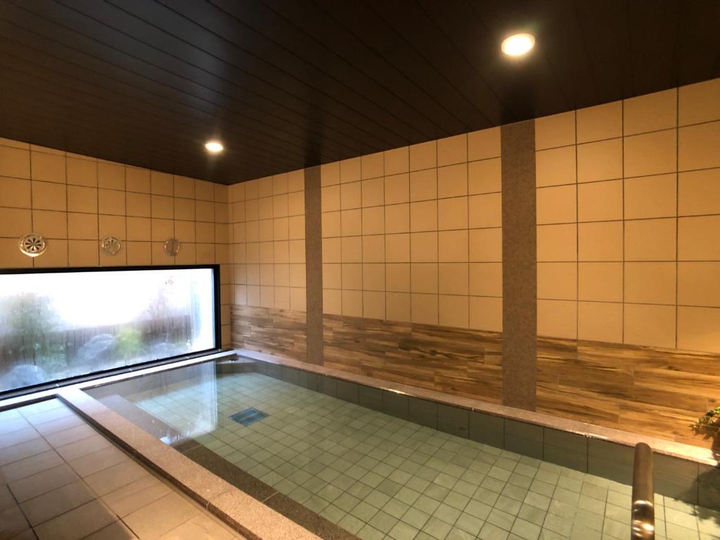 Bazén v ubytování Hotel Route-Inn Tsuchiura nebo v jeho okolí