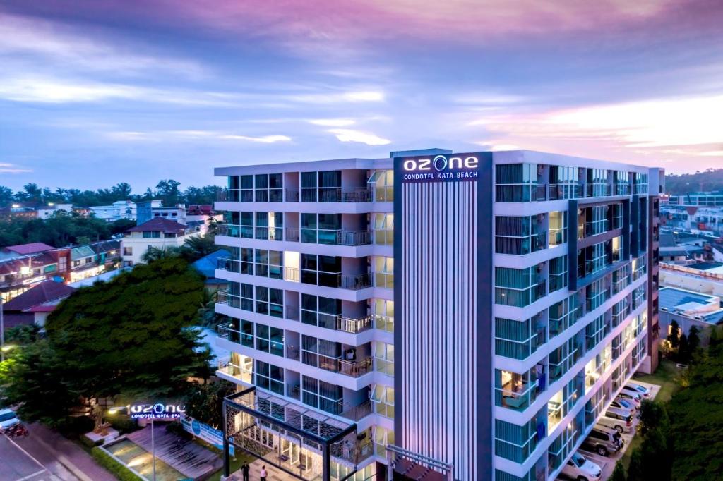 an image of an apartment building in a city at Ozone Condotel in Kata Beach