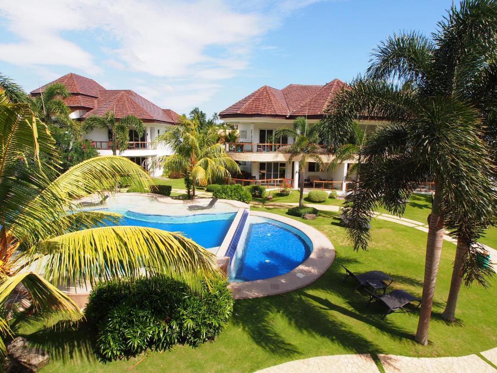 Výhled na bazén z ubytování Vida Homes Condo Resort nebo okolí