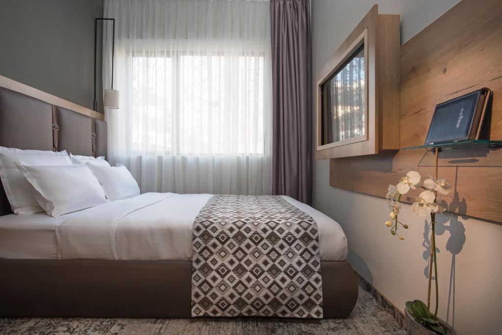 Postel nebo postele na pokoji v ubytování THE STAY Boutique Hotel Central Square - Free Compliments - Free Wi-Fi - TOP LOCATION - Nearby Paid Parking