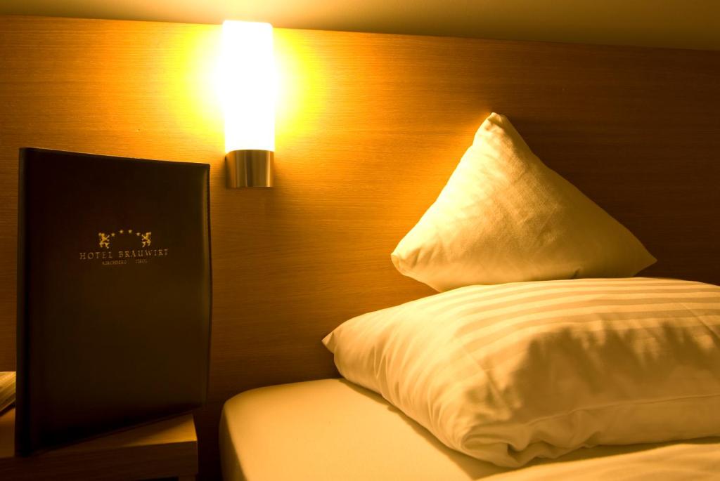 Posteľ alebo postele v izbe v ubytovaní Hotel Bräuwirt