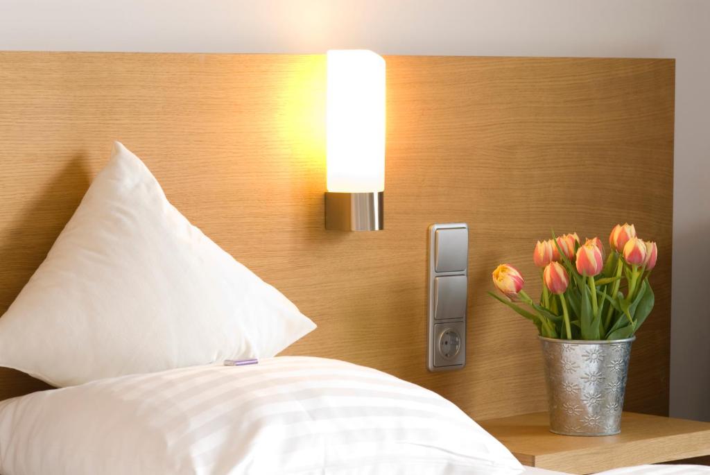Posteľ alebo postele v izbe v ubytovaní Hotel Bräuwirt
