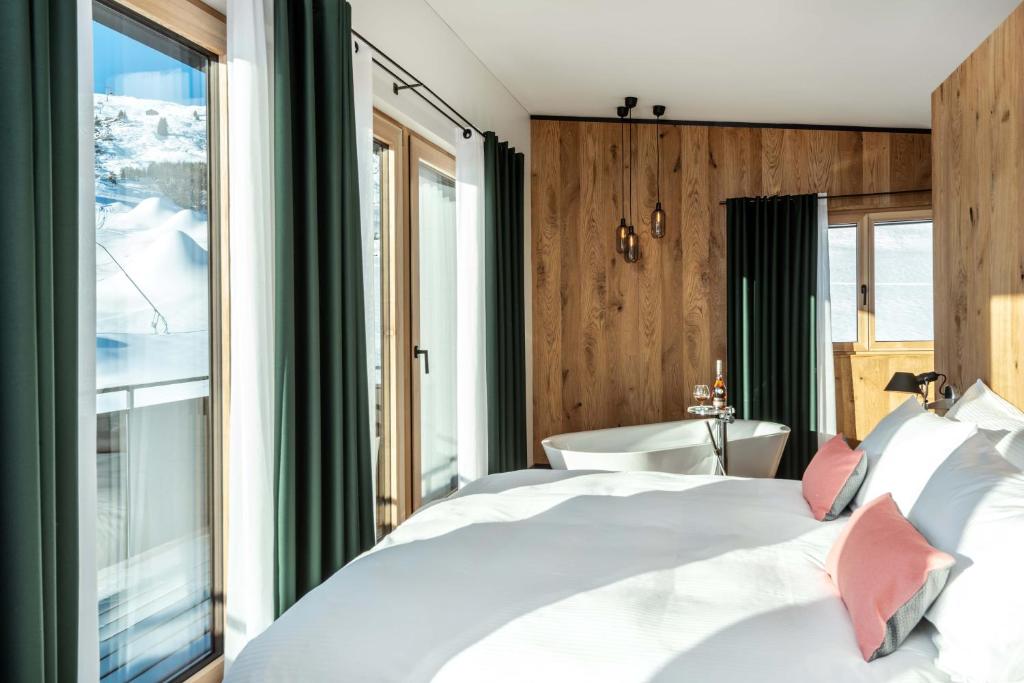 Postel nebo postele na pokoji v ubytování Boutique Hotel Pellas