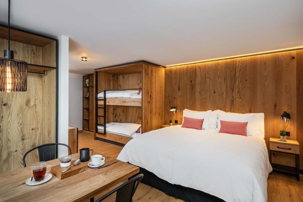 Postel nebo postele na pokoji v ubytování Boutique Hotel Pellas