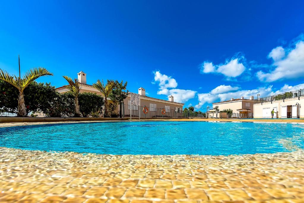 The swimming pool at or close to Garden View La Arena