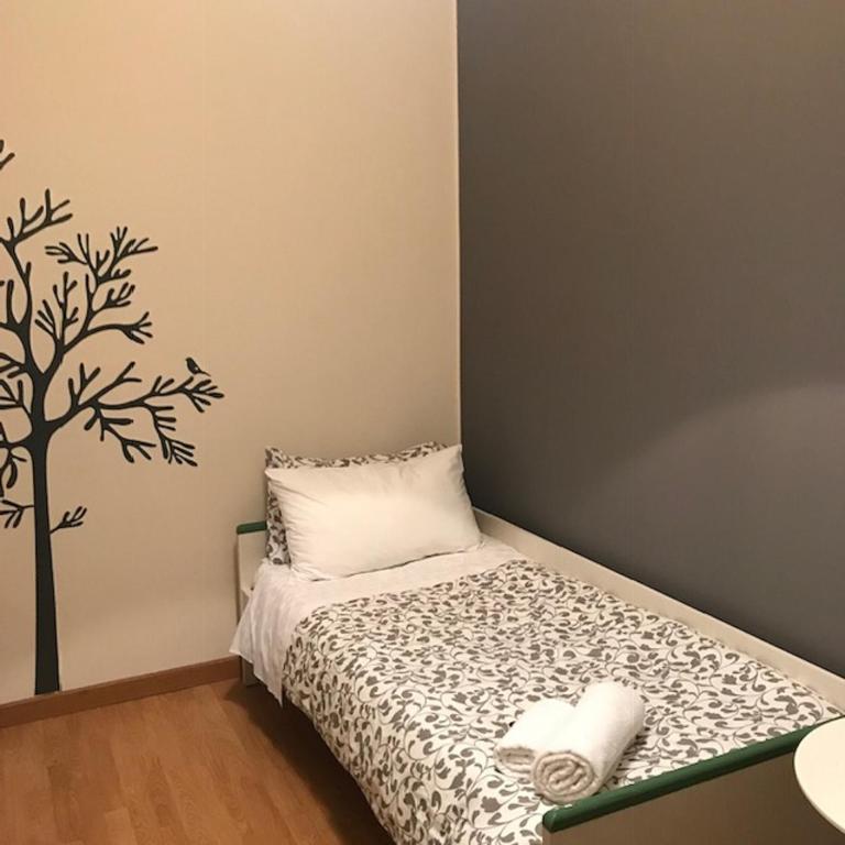 Postel nebo postele na pokoji v ubytování MyRoom In Town