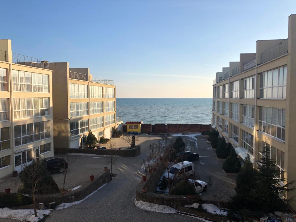 a view of the ocean from an apartment building at Морская жемчужина in Odesa