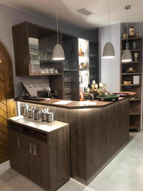 Kuchyň nebo kuchyňský kout v ubytování Hotel Gurman