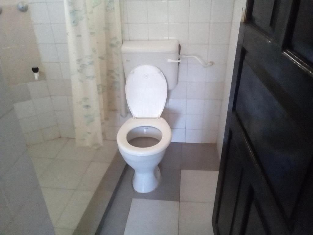 Koupelna v ubytování Ashari Hotel
