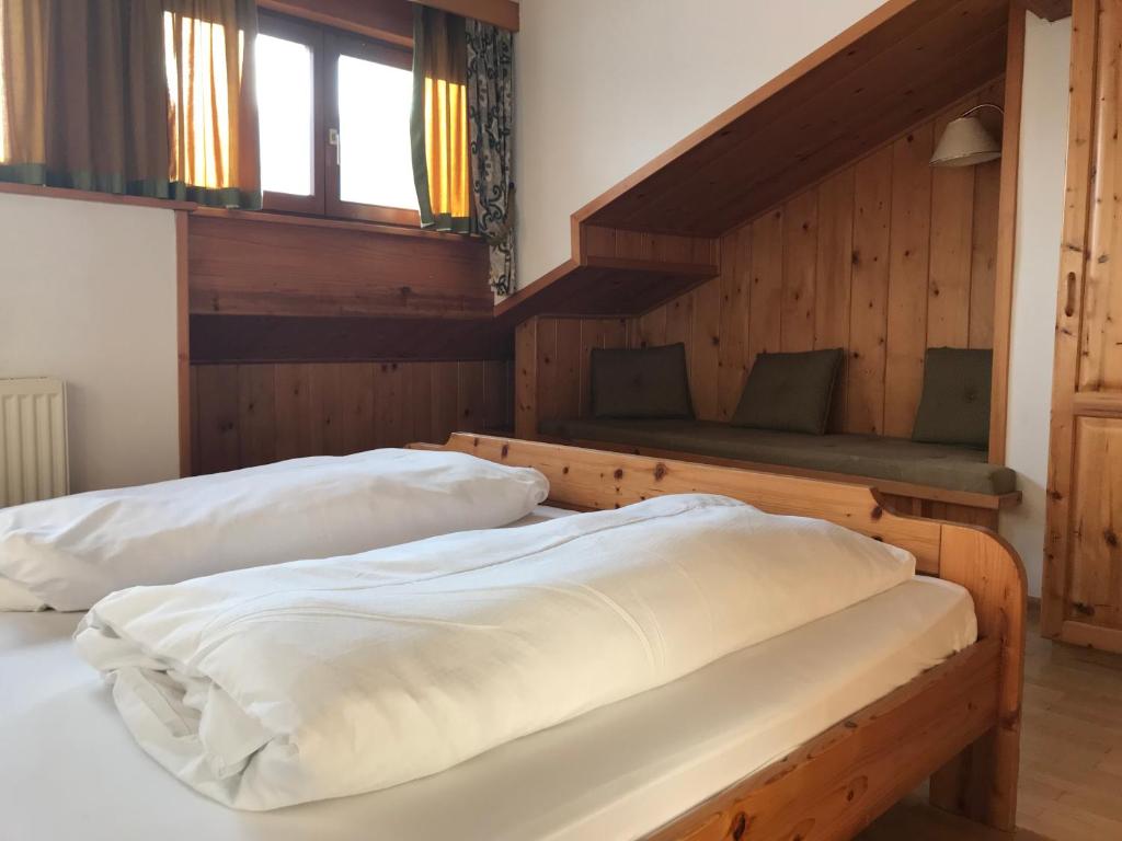 Postel nebo postele na pokoji v ubytování Appartements Rosenstockl