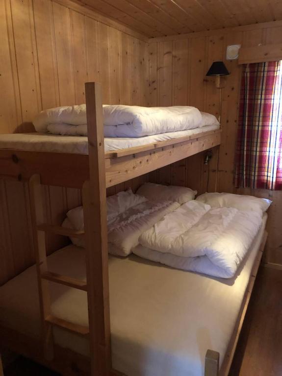 Postel nebo postele na pokoji v ubytování Haglebu Turistheim