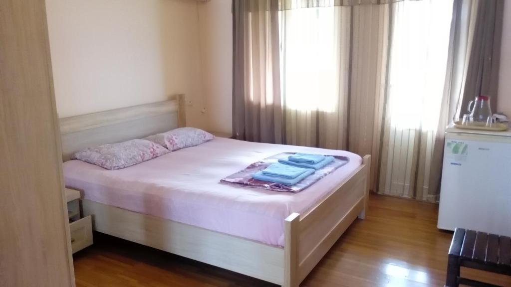 Postel nebo postele na pokoji v ubytování Guest House Rusalka