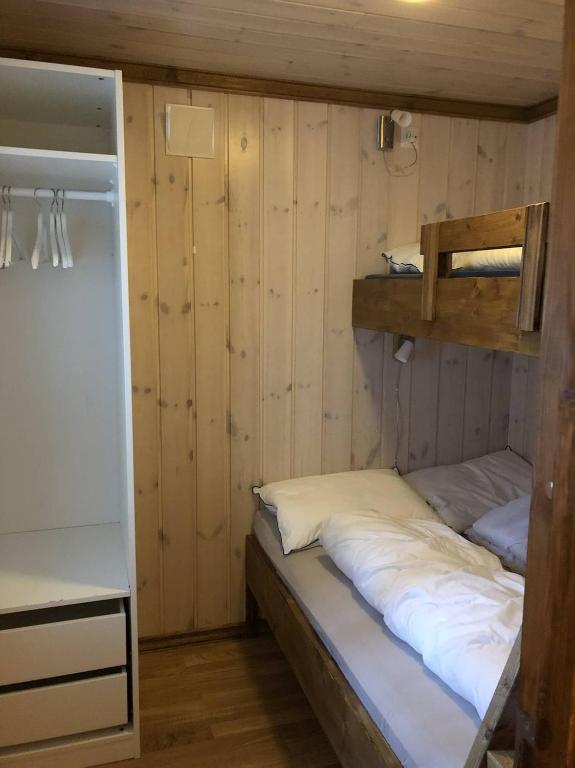Postel nebo postele na pokoji v ubytování Haglebu Turistheim
