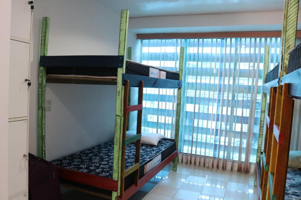 Postel nebo postele na pokoji v ubytování Hostel 33 Brazil