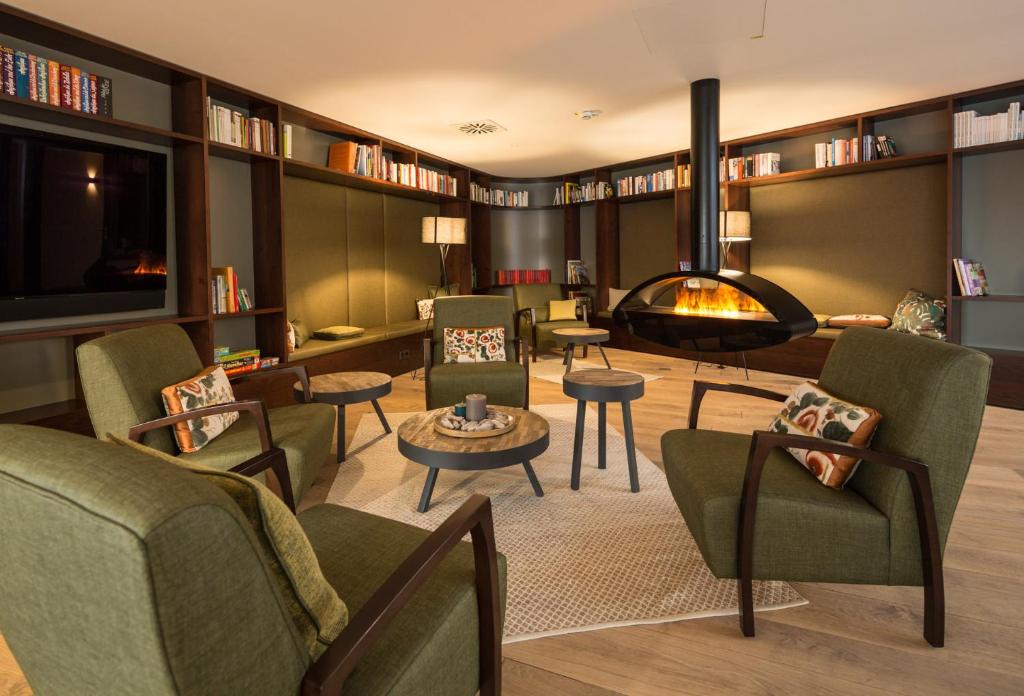 Posezení v ubytování Das ACKER Hotel
