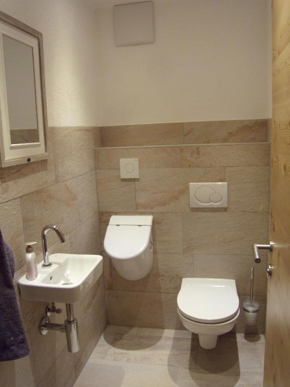 Koupelna v ubytování Appartements Schweiberer