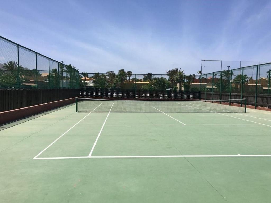 Tenis a/nebo squash v ubytování Apartment Gardenia, Oasis Tamarindo nebo okolí