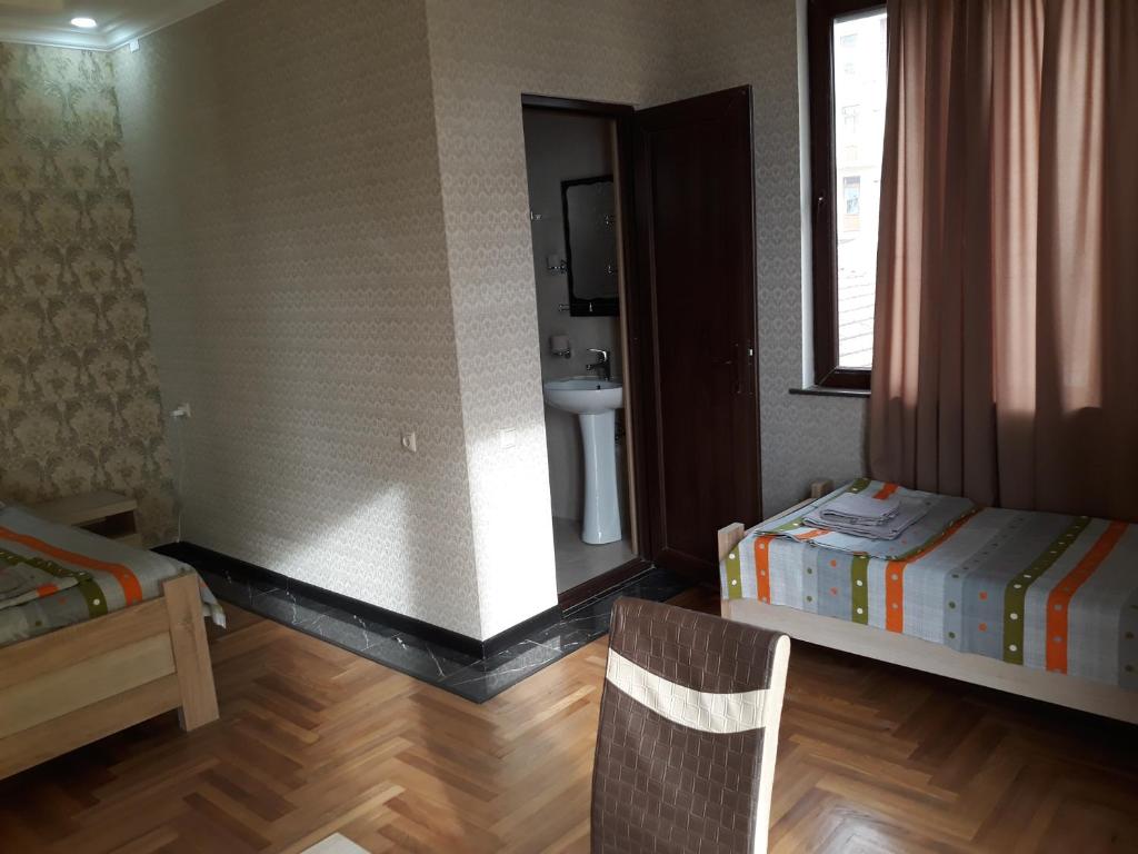 Postel nebo postele na pokoji v ubytování Guest House Rusalka
