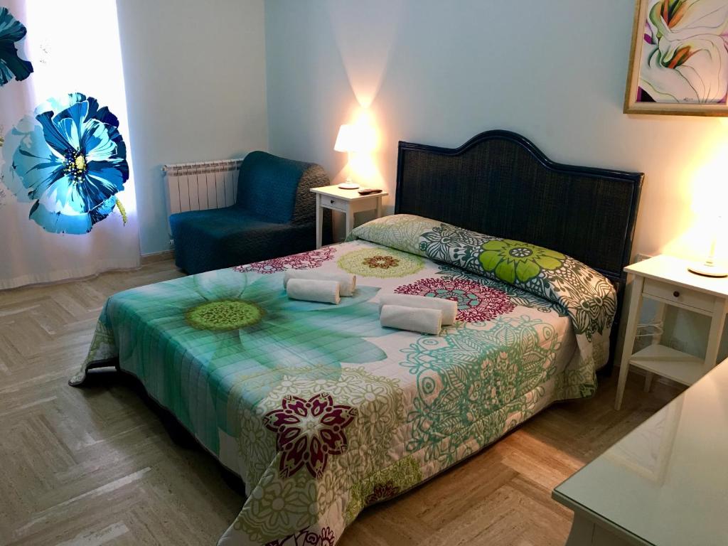Posteľ alebo postele v izbe v ubytovaní B&B Bel Orizzonte