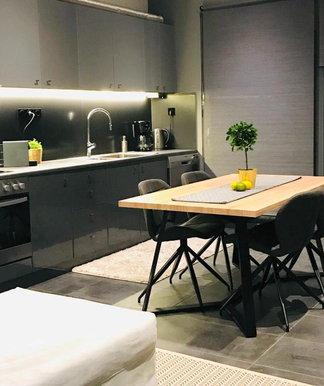 Kuchyňa alebo kuchynka v ubytovaní L apartment