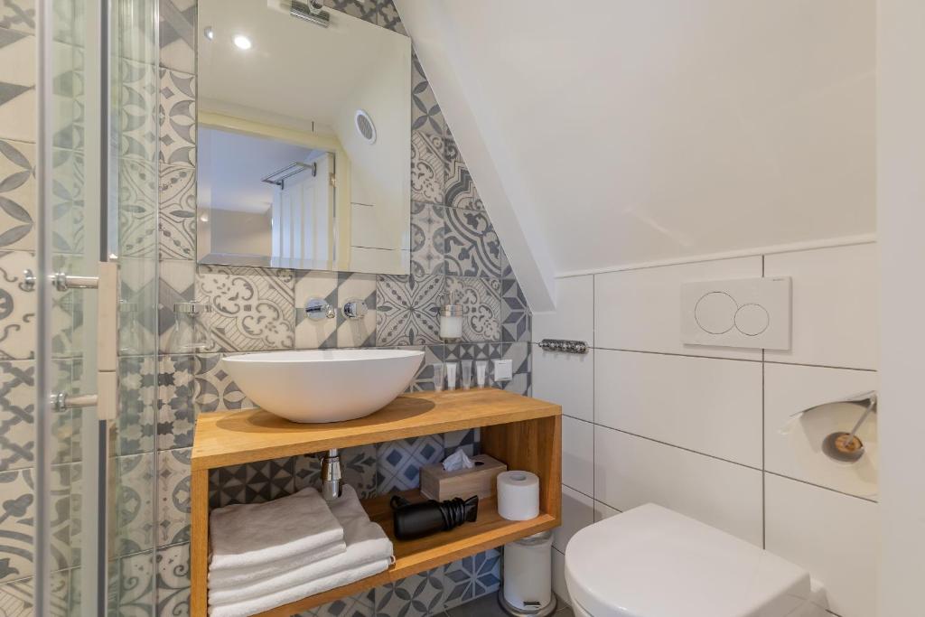 Koupelna v ubytování ExLibris Boutique Hotel
