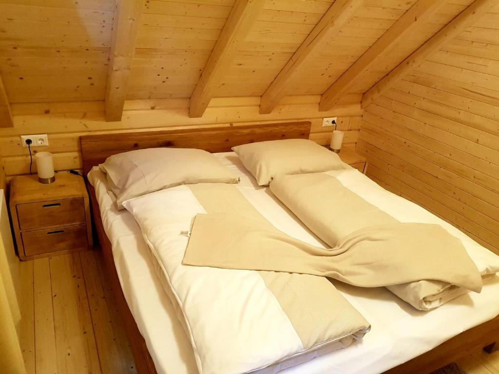 Postel nebo postele na pokoji v ubytování Stubihuettn
