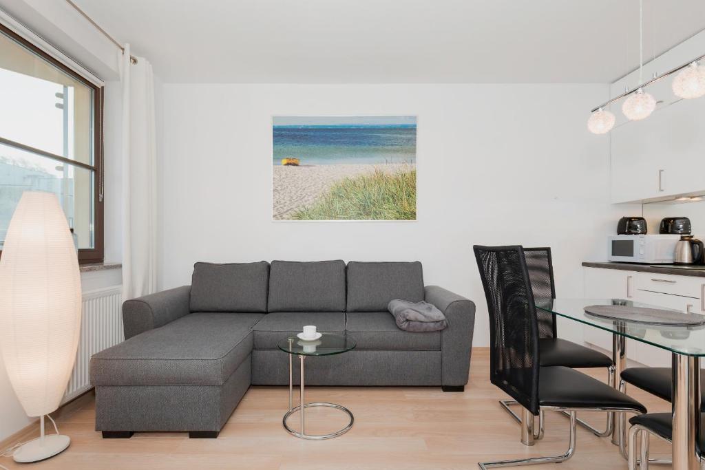 Posezení v ubytování Wind Rose Quarter Apartments by Noclegi Renters