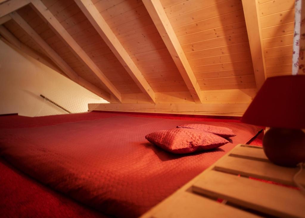 Postel nebo postele na pokoji v ubytování Apartmány Fišerka