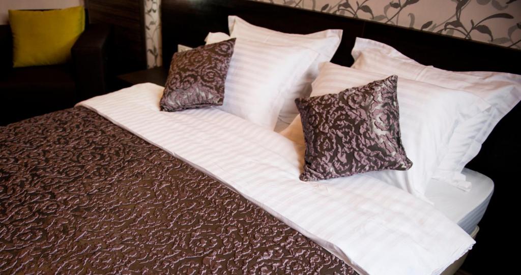 Postel nebo postele na pokoji v ubytování Boutique Apart - Hotel iArcadia