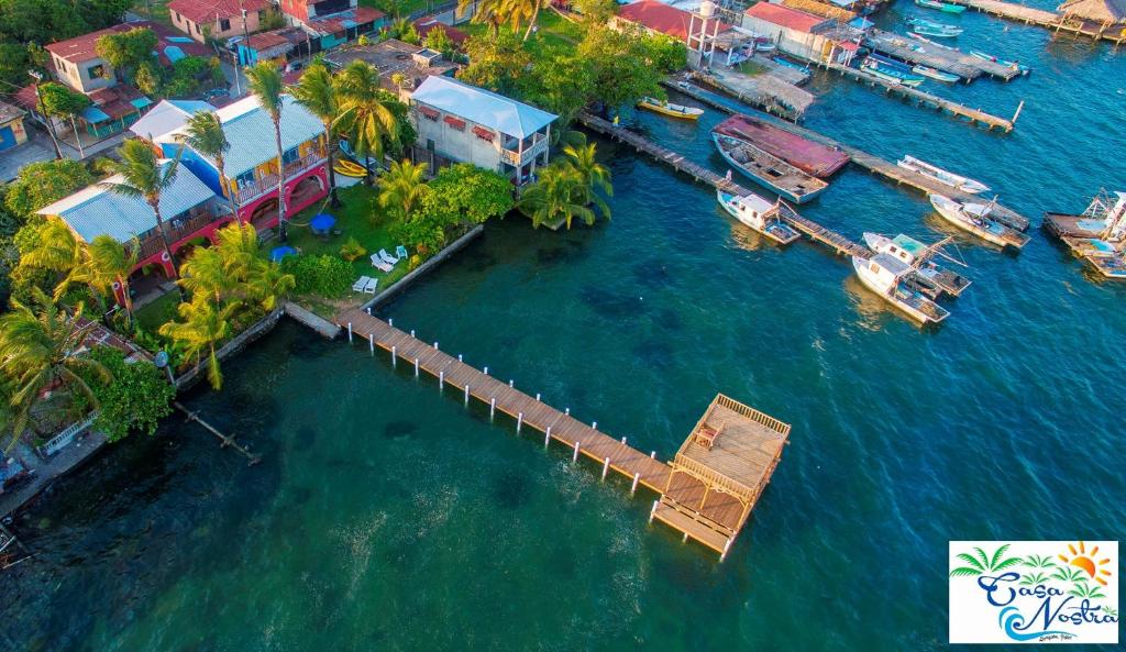 an aerial view of a dock with boats in the water at Casa Nostra in Lívingston