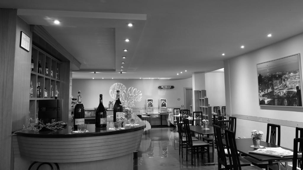 Nápoje v ubytování Hotel Romanisio