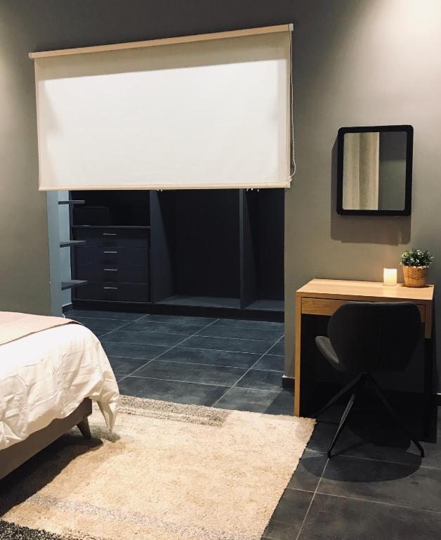 Posteľ alebo postele v izbe v ubytovaní L apartment