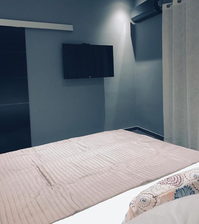 Posteľ alebo postele v izbe v ubytovaní L apartment