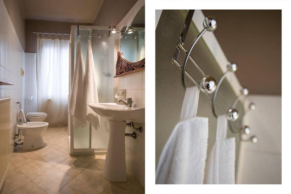 クレモナにあるbb26 Buoso apartment city centerの洗面台とトイレ付きのバスルームの写真2枚