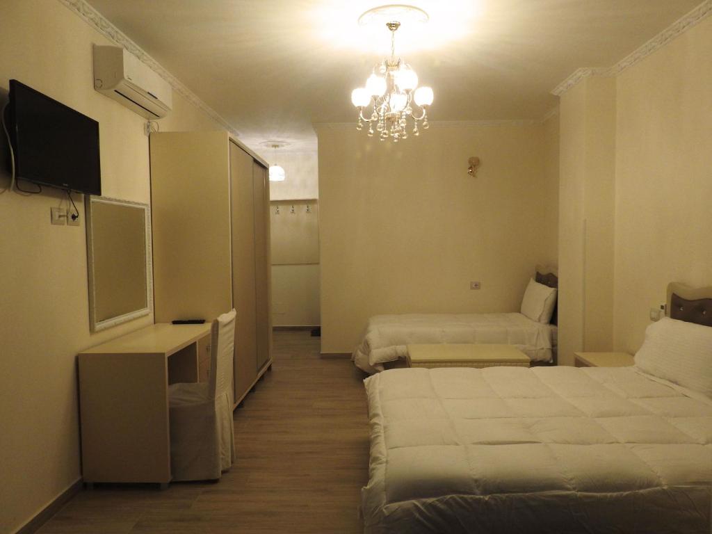 Postel nebo postele na pokoji v ubytování Hotel 3 Vellezerit