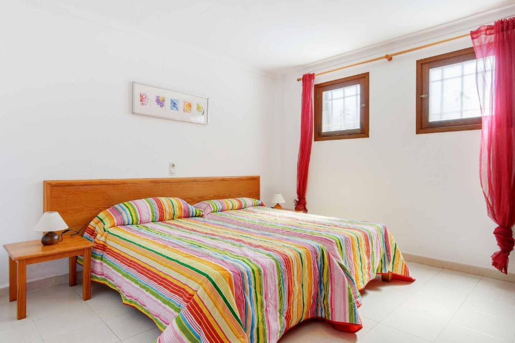 Postel nebo postele na pokoji v ubytování Villa Pou Tres