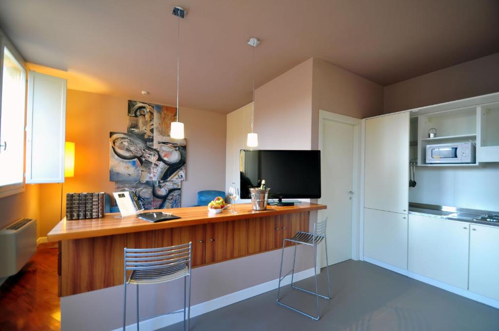 Kuchyň nebo kuchyňský kout v ubytování Hotel Ferrara