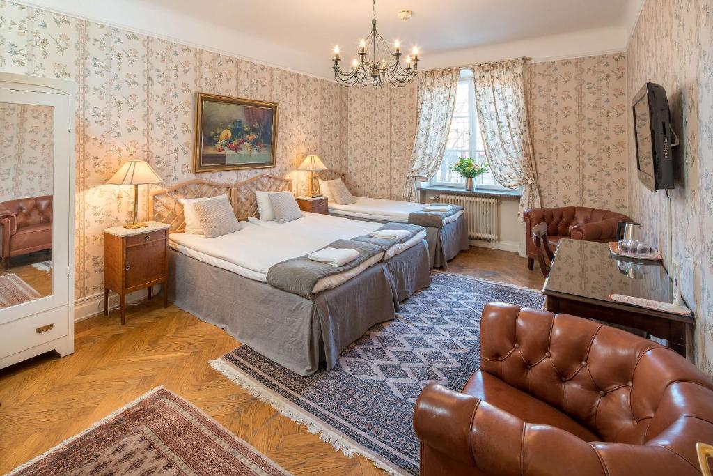 Postel nebo postele na pokoji v ubytování Wasa Park Hotel