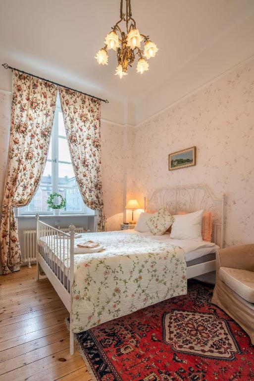 Postel nebo postele na pokoji v ubytování Wasa Park Hotel