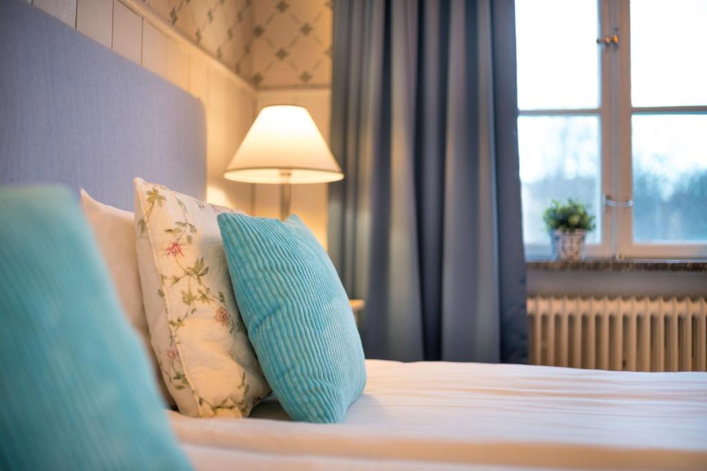 Postel nebo postele na pokoji v ubytování Wasa Park Hotel