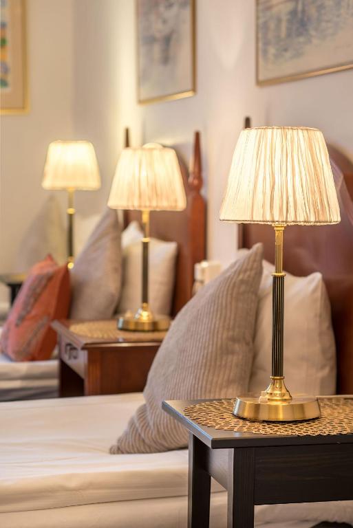 Postel nebo postele na pokoji v ubytování Wasa Park Hotel