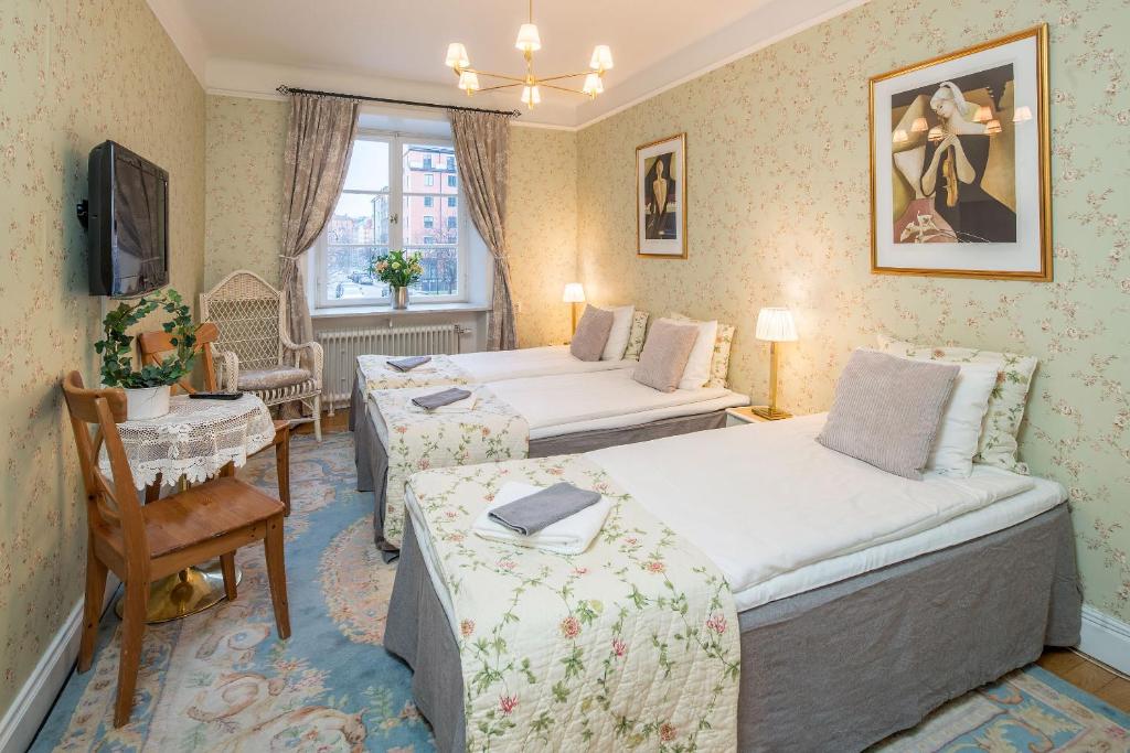 Postel nebo postele na pokoji v ubytování Wasa Park Hotel