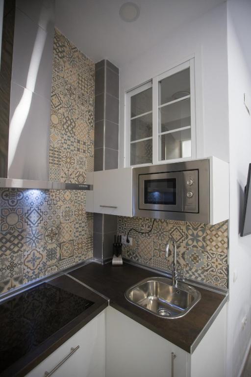Kuchyňa alebo kuchynka v ubytovaní Apartamentos Catedral