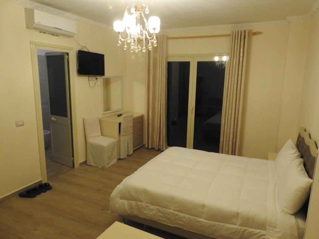 Postel nebo postele na pokoji v ubytování Hotel 3 Vellezerit