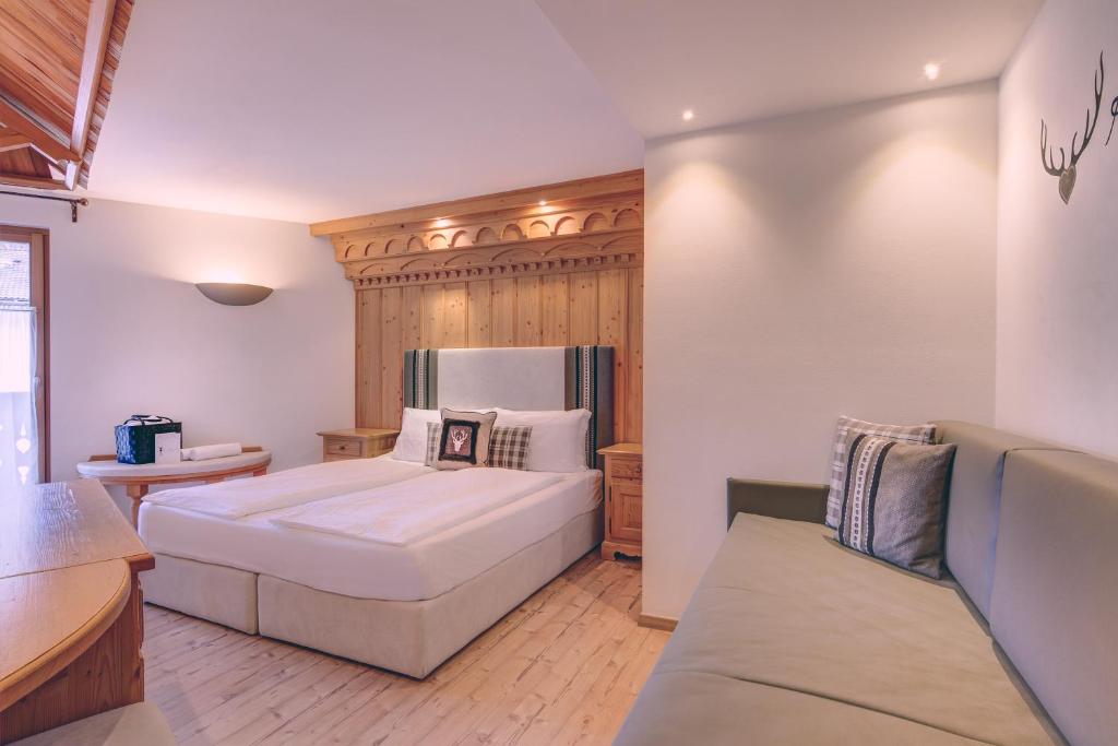 Postel nebo postele na pokoji v ubytování Hotel Madonnina Resort And Wellness