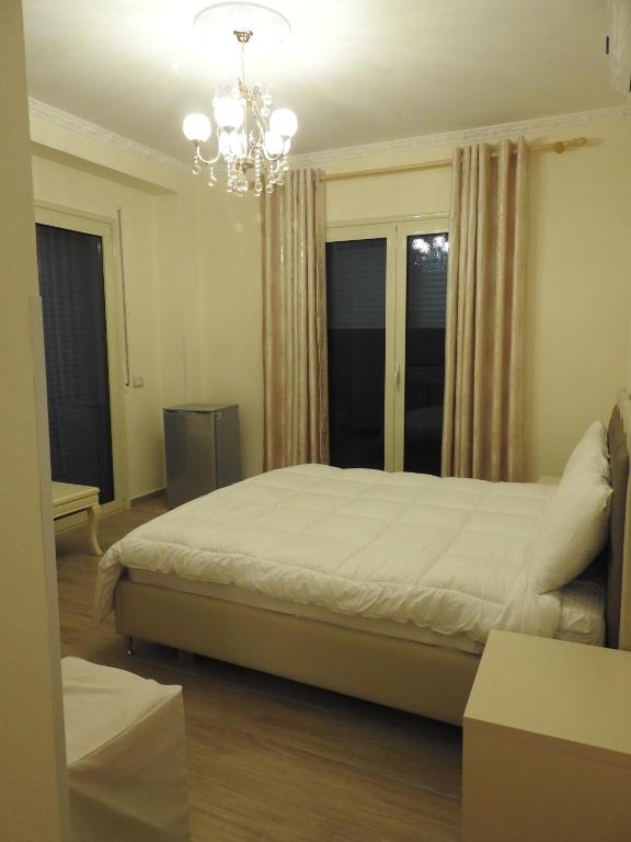 Postel nebo postele na pokoji v ubytování Hotel 3 Vellezerit