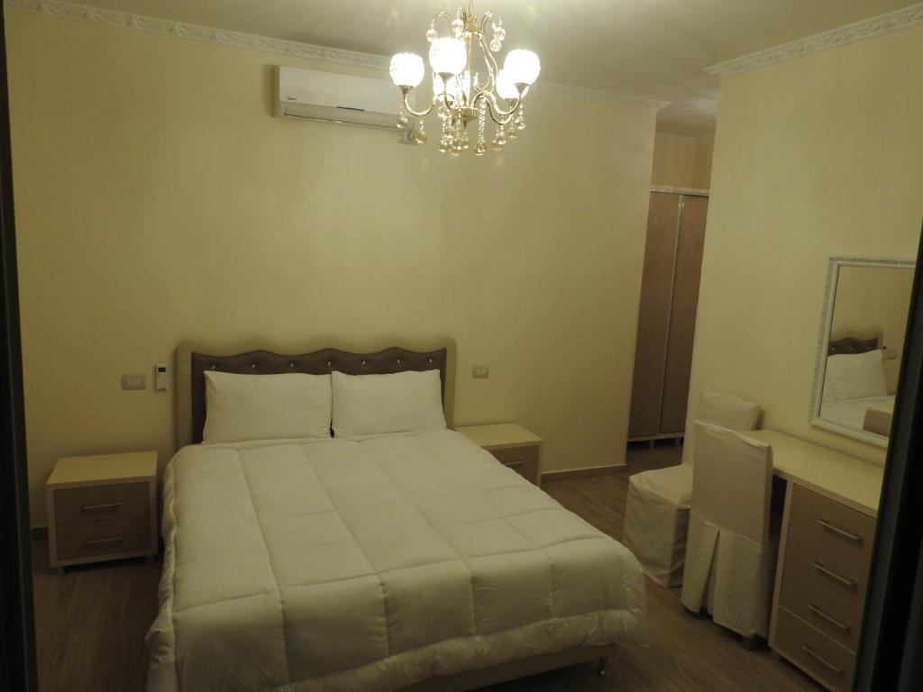 Postel nebo postele na pokoji v ubytování Hotel 3 Vellezerit